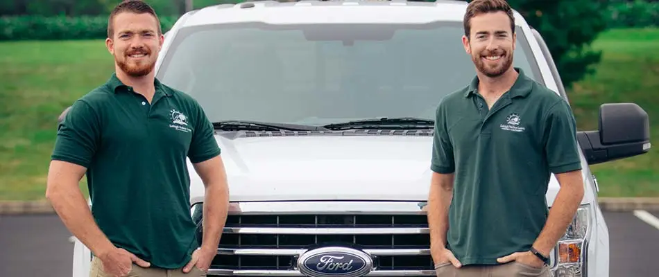 Lehigh Valley Lawn team by a work truck in Macungie, PA.