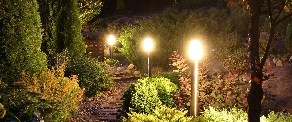 Outdoor lights along a walkway and landscape in Hereford Township, PA.
