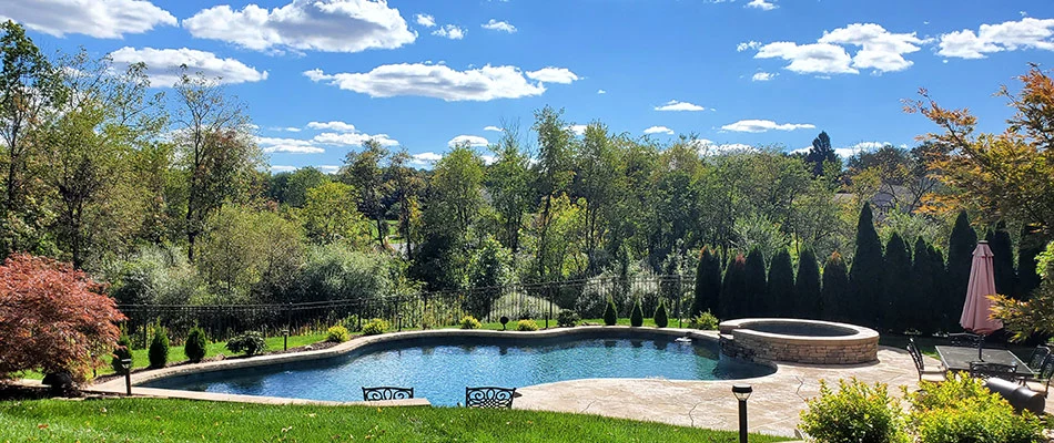 Patio installed beside a pool in Emmaus, PA.