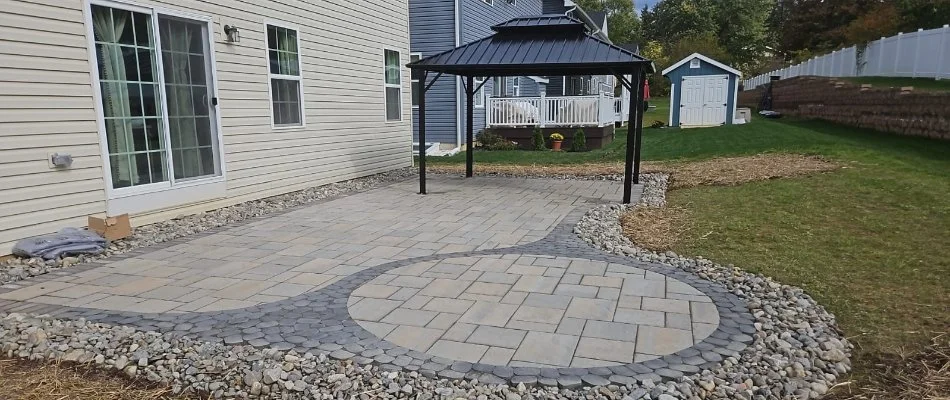 Patio with a pavilion in the backyard on a property in Hellertown, PA.
