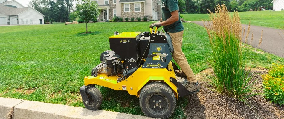 Lawn care service being performed on a property in Bally, PA.